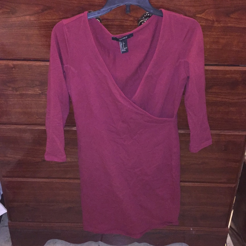 Red long sleeve v neck dress.